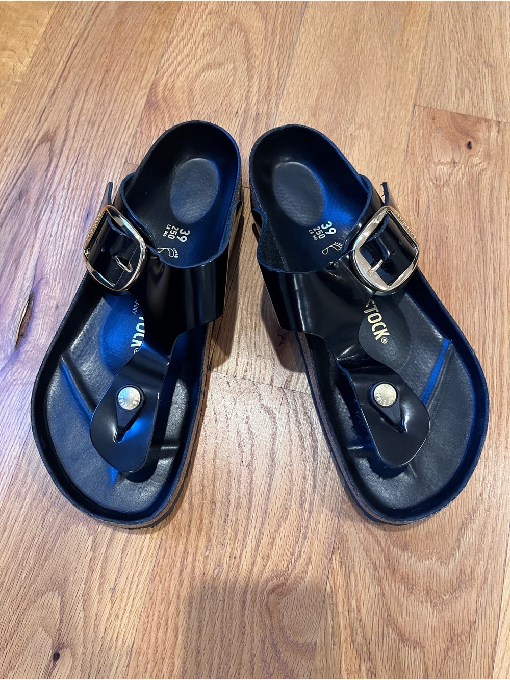 Birkenstock Kids Black Thong Sandals with Gold Buckles